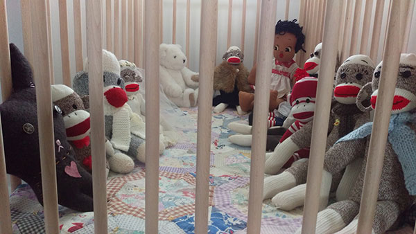 Baby crib in Eileen Beha's writing studio